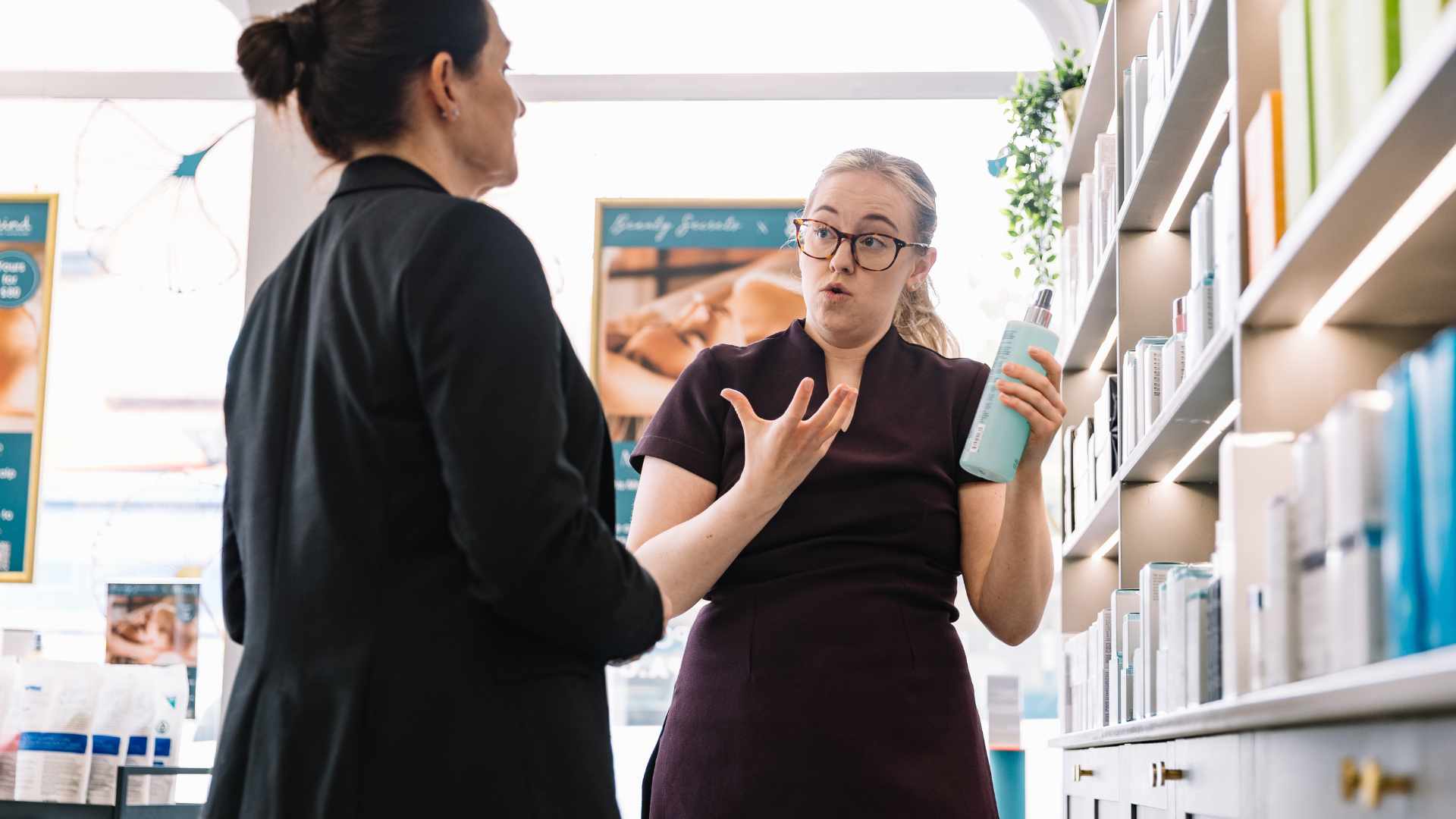 Beauty Secrets Expert Therapist talking to a client.