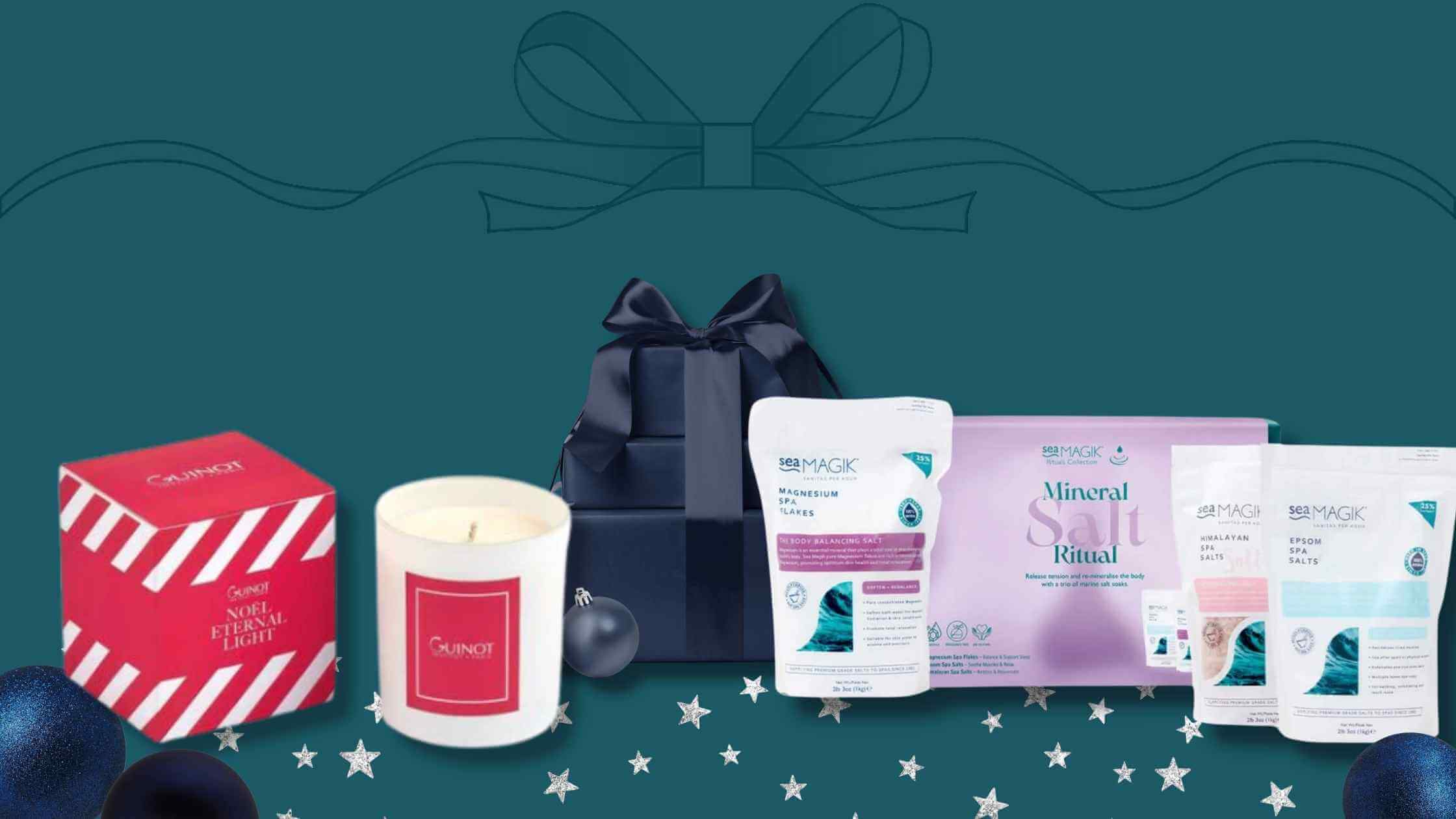 Guinot and Sea Magik Christmas gift sets with christmas decorations in the background