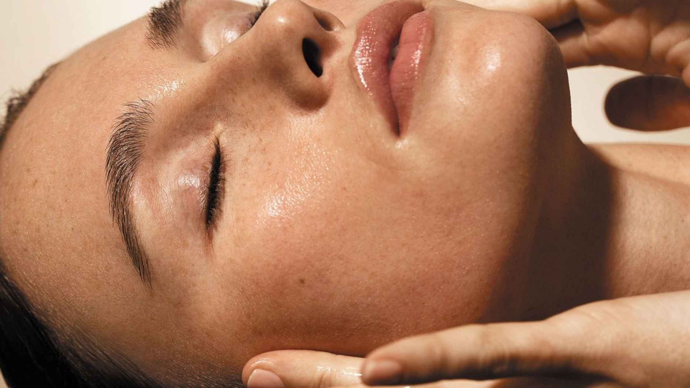 close up of a woman's freshly waxed face