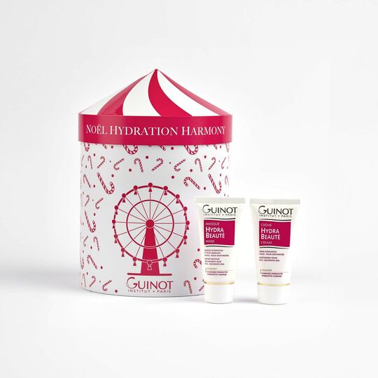 Guinot skincare products with a decorative box on a white background