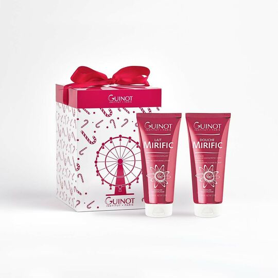 Guinot gift set with two pink tubes and a decorative box on a white background