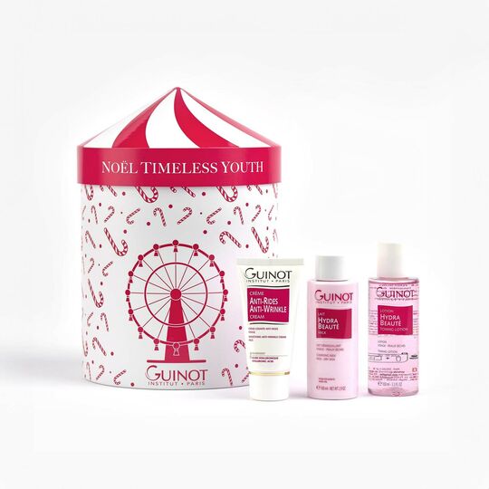 Guinot skincare products including a box labeled 'Noel Timeless Youth' on a white background