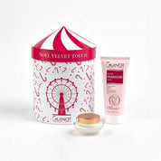 Guinot skincare products including a cream, balm, and decorative box on a white background