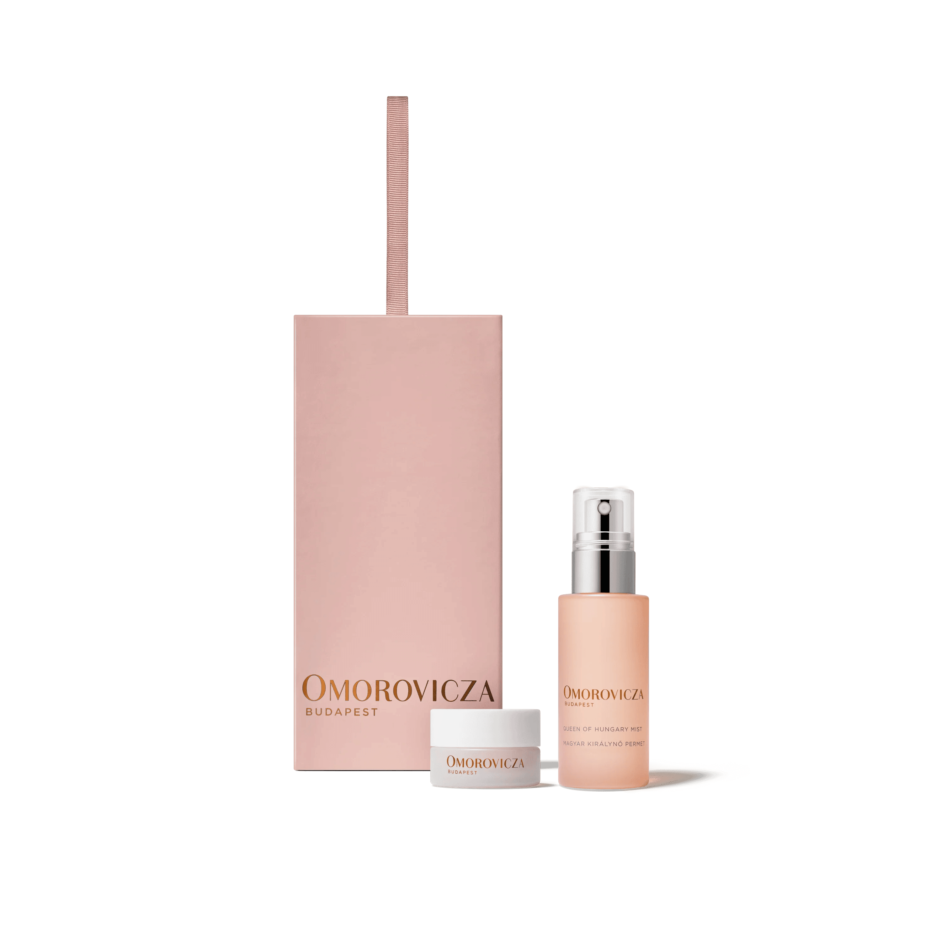 Omorovicza skincare products including a box, bottle, and jar on a black background